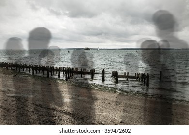 Spirits Or Ghosts Like Shadows Standing On Beach