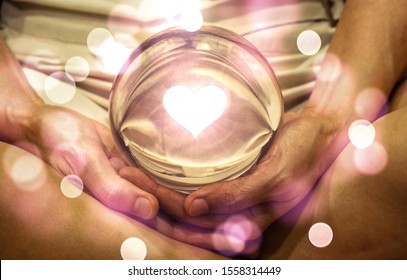 Spiritual Background: Fortune Teller Concept, Meditation Hand With Shining Heart Shape In Magic Glass Ball,sign Of Love And Peaceful