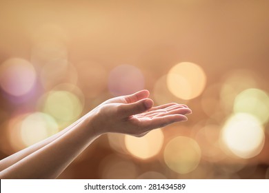 Spiritual support, charity donation, holy religion and world human spirit day concept with woman prayer's hand praying worship for heavenly god under candle moon light