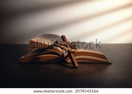 Spirituality, Religion and Hope Concept. Holy Bible and Cross on Desk. Symbol of Humility, Supplication,Believe and Faith for Christian People