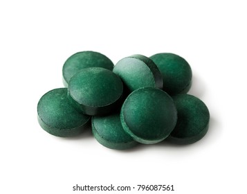 Spirulina Tablets Isolated On A White Background