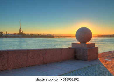 Spit Of Vasilyevsky Island And Neva River At Dawn With Granite Ball In Front Of Sunrise, Saint Petersburg, Russia
