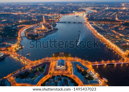 Spit of Vasilyevsky Island. St. Petersburg. Neva River. Summer night top view of Petersburg. Exchange. Rastral columns. The Cabinet of Curiosities. The Palace Bridge.