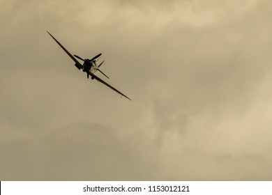 Spitfire fighter on a cloudy summer day