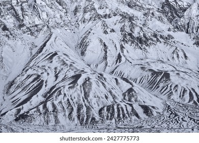 Spiti Valley in India, snow winter. Himalaya mountain range, aerial view on the hill, Ladakh in India. Asia mountain Himalayas, blue winter landscape with rocky hill a snow range. Wild nature India.  - Powered by Shutterstock