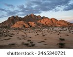 The Spitzkoppe in the desert. A group of bald granite peaks between Usakos and Swakopmund in the Namib desert of Namibia in the late afternoon. It is  The Spitzkoppe.