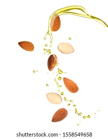 Splash Of Almond Oil And Nuts On White Background