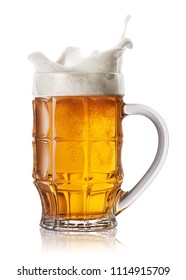 Splash In Beer Mug Isolated On White Background. Splash Foam In Faceted Mug Of Light Beer