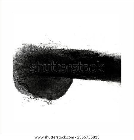 splash of black powder on a white background. black color powder on white worksheet.

