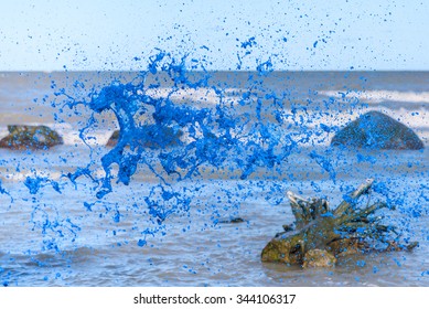 Splash of blue water on sea background
