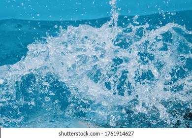 Splash Of Blue Water In The Pool