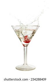 Splash Of Cherry In Martini Glass Isolated On White Background