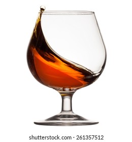 Splash Of Cognac In Glass