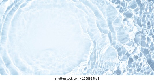 Splash cosmetic moisturizer water micellar toner or emulsion  blue colored abstract background - Shutterstock ID 1838925961
