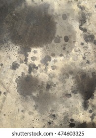 splash dirty oil stain on concrete floor - Shutterstock ID 474603325