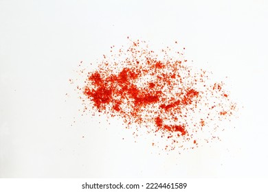 splash of dry organic kashmiri red chili pepper powder isolated on white  background selective focus,well known for dark red color food recipe  in indian gujarati food,top view - Shutterstock ID 2224461589