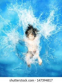 Splash Jumping Into The Pool Of Little Cute Boy