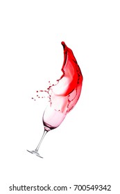 splash of red wine from goblet on a white background