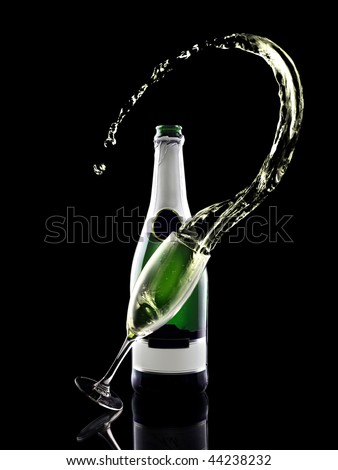 Splash of shampagne with bottle and glass