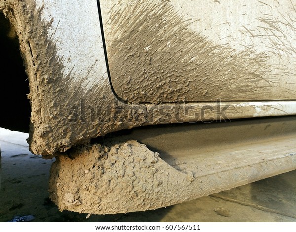 Splashes of mud. Close up of a white car mud\
splash. Background\
texture.