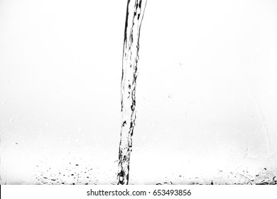 Splashes Of Water On A White Background. Water Jet.