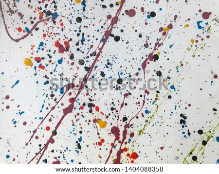 Splashing of multi-color flick on white background