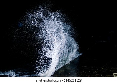 Splashing wave on the Black sea in the night. - Shutterstock ID 1145261129