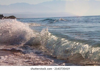 Splashing waves of a blue sea on a summer day. Selective focus. High quality photo