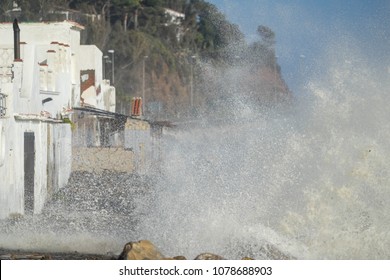 Splashing waves to the rocks.