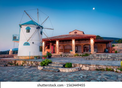 Splendid morning view of Potamitis Windmill. Beautiful summer scene of Zakynthos island, Korithi location, Ionian Sea, Greece, Europe. Beauty of countryside concept background.