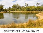 Splendid scenic view of the central wetlands and lake at Dalyellup near Bunbury Western Australia which is home to ducks, coots and many other water birds on a fine, cloudy late summer morning.