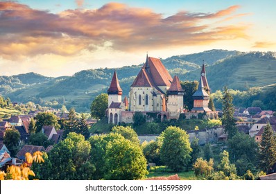 Splendid summer view of Fortified Church of Biertan, UNESCO World Heritage Sites since 1993. Colorful morning cityscape of Biertan town, Transylvania, Romania, Europe. Traveling concept background. 