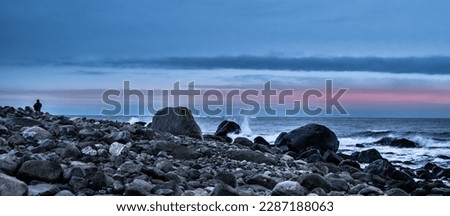 Splish splash on the rocky beach, Norway