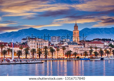 Split, Croatia. View of Split the second largest city of Croatia at night. Shore of the Adriatic Sea and famous Palace of the Emperor Diocletian. Traveling concept background. Mediterranean countries.