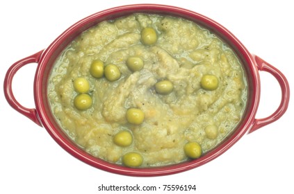 Split Pea Soup From Above In A Red Crock Isolated On White With A Clipping Path.