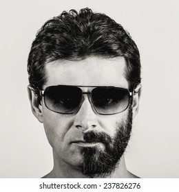 Split Personality - Black And White Portrait Of Man With Half Shaved Face And Sun Glasses