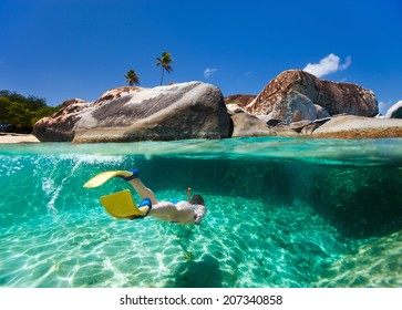 Split Photo Of Young Woman Snorkeling In Turquoise Tropical Water Among Huge Granite Boulders At The Baths Beach Area Major Tourist Attraction On Virgin Gorda, British Virgin Islands, Caribbean