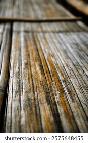 Split pieces of bamboo are used as floor mats. selective focus