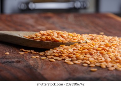 Split Red Lentils In The Wooden Spoon 