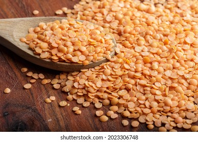 Split Red Lentils In The Wooden Spoon 