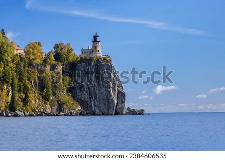 Split Rock Lighthouse - A lighthouse on a cliff along Lake Superior in autumn.