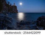 Split Rock Lighthouse on Lake Superior in the light of the rising full moon