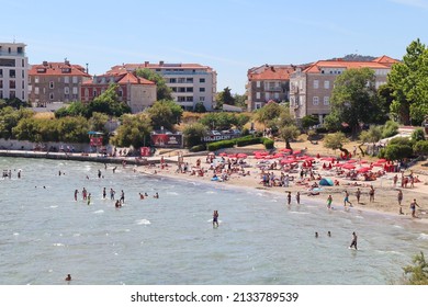 Split,Croatia, 08.03.2022. Swimmers On The Beach Bacvice In Split