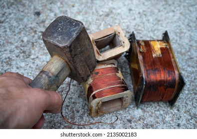 Splitting Old Engines With Copper Wire Inside. Extraction Of Non-ferrous Metal From Broken Machinery.Hunters For Non-ferrous Metal. Copper Wire In Coils.