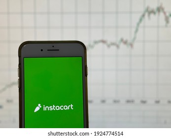 Spokane, WA, USA - February 2021 - Instacart App And Stock Chart. Instacart Operates A Grocery Deliver And Pick Up Service.