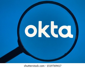Spokane, WA/USA- October 2019: Magnified view of Okta app open on a tablet. Okta provides cloud software that helps companies manage and secure user authentication for applications