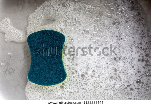 Sponge with bubbles in the\
sink