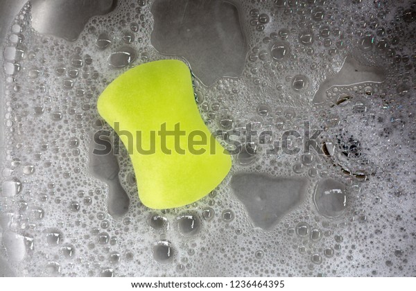 Sponge with bubbles in the\
sink