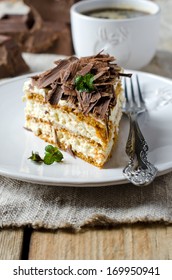Sponge cake with cream and chocolate - Shutterstock ID 169950941