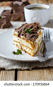 Sponge cake with cream and chocolate - Shutterstock ID 170936864